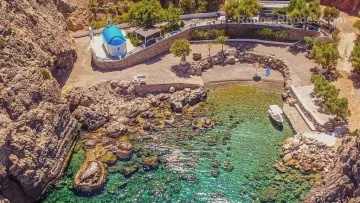 Discovering the Hidden Gem: A Visit to the Blue and White Church of Agios Fanourios on a Secret Private Beach in Rhodes